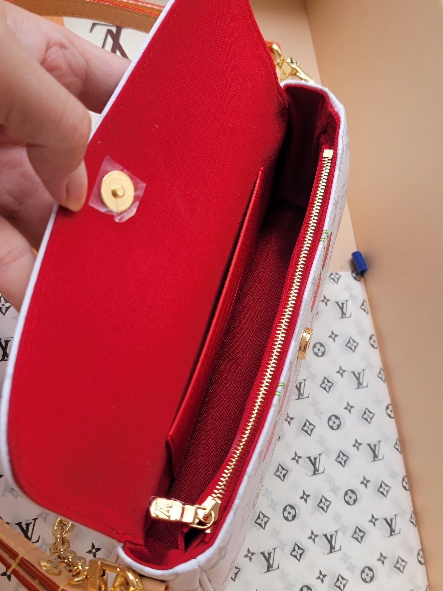Stylish Louis Vuitton Cherry - Printed Bag With Gold Chain For Fashion Enthusiasts