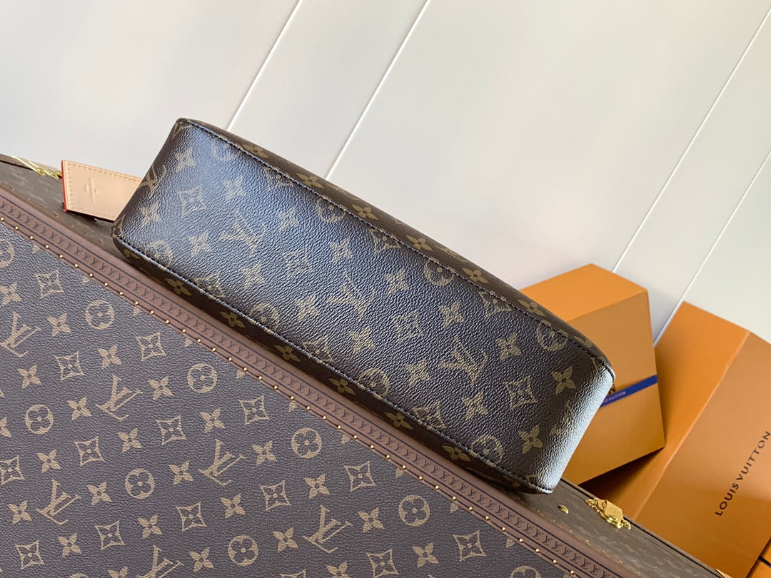 Chic Louis Vuitton Monogram Hobo Bag With Stylish Curved Shape And Top Handle