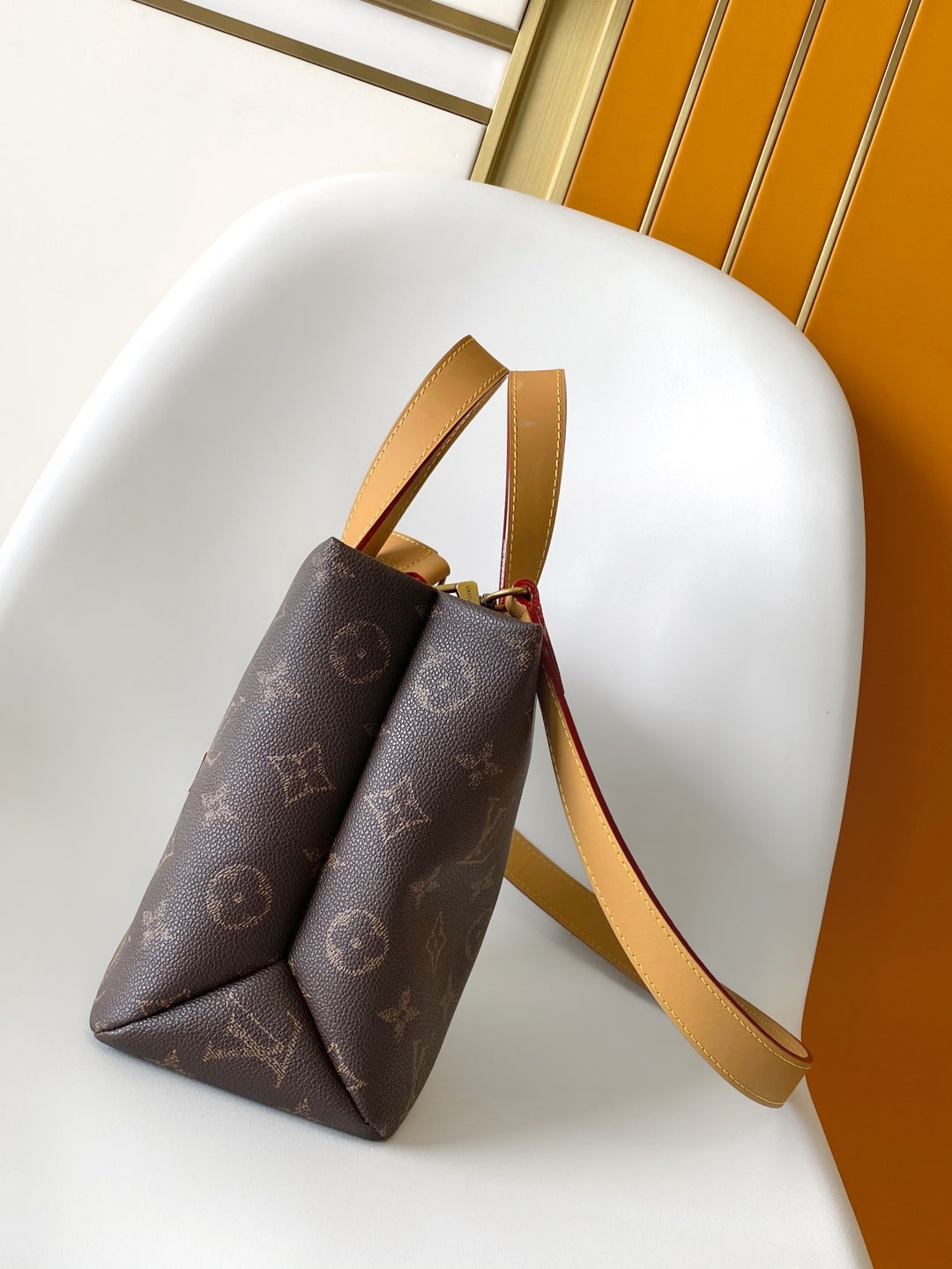 Elegant Louis Vuitton Monogram Canvas Tote Bag With Leather Handles And Gold Branding