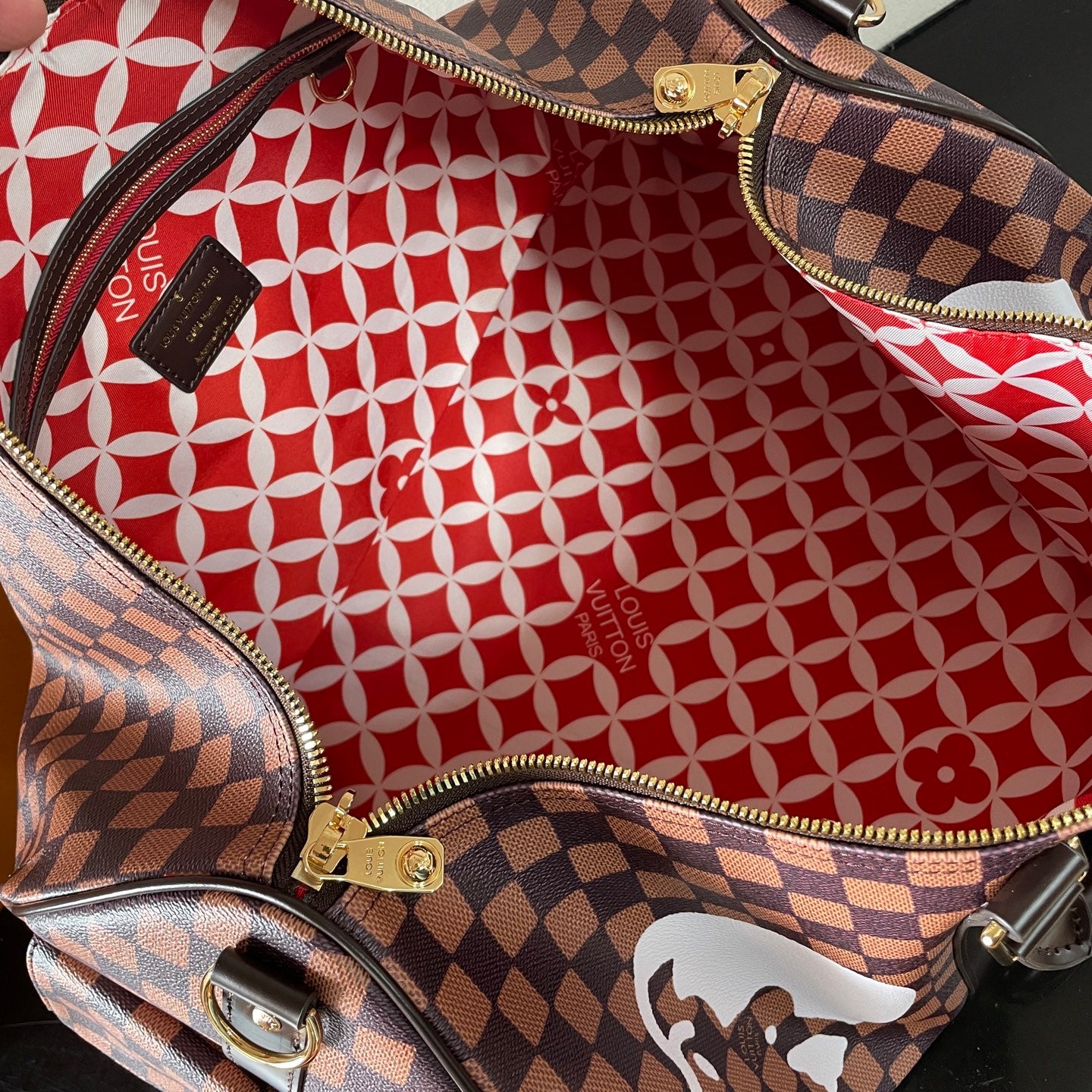 Louis Vuitton Damier Pattern Travel Bag With Unique Graphic Design For Fashion Trips