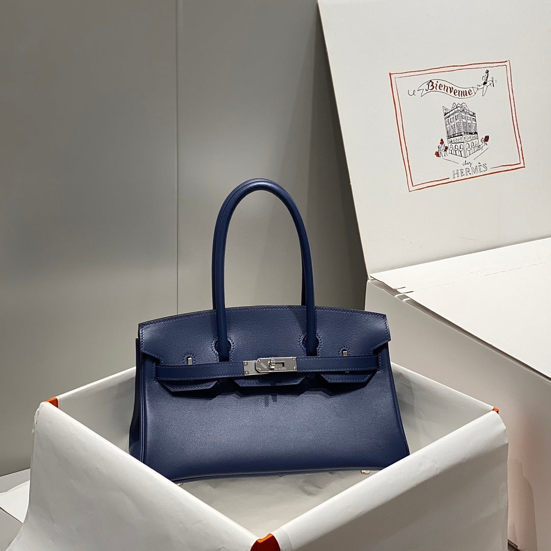 Timeless Hermès Birkin Bag in Classic Brown Leather with Silver Hardware 169