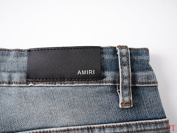 Amiri Light Blue Distressed Denim Shorts With Stylish Logo