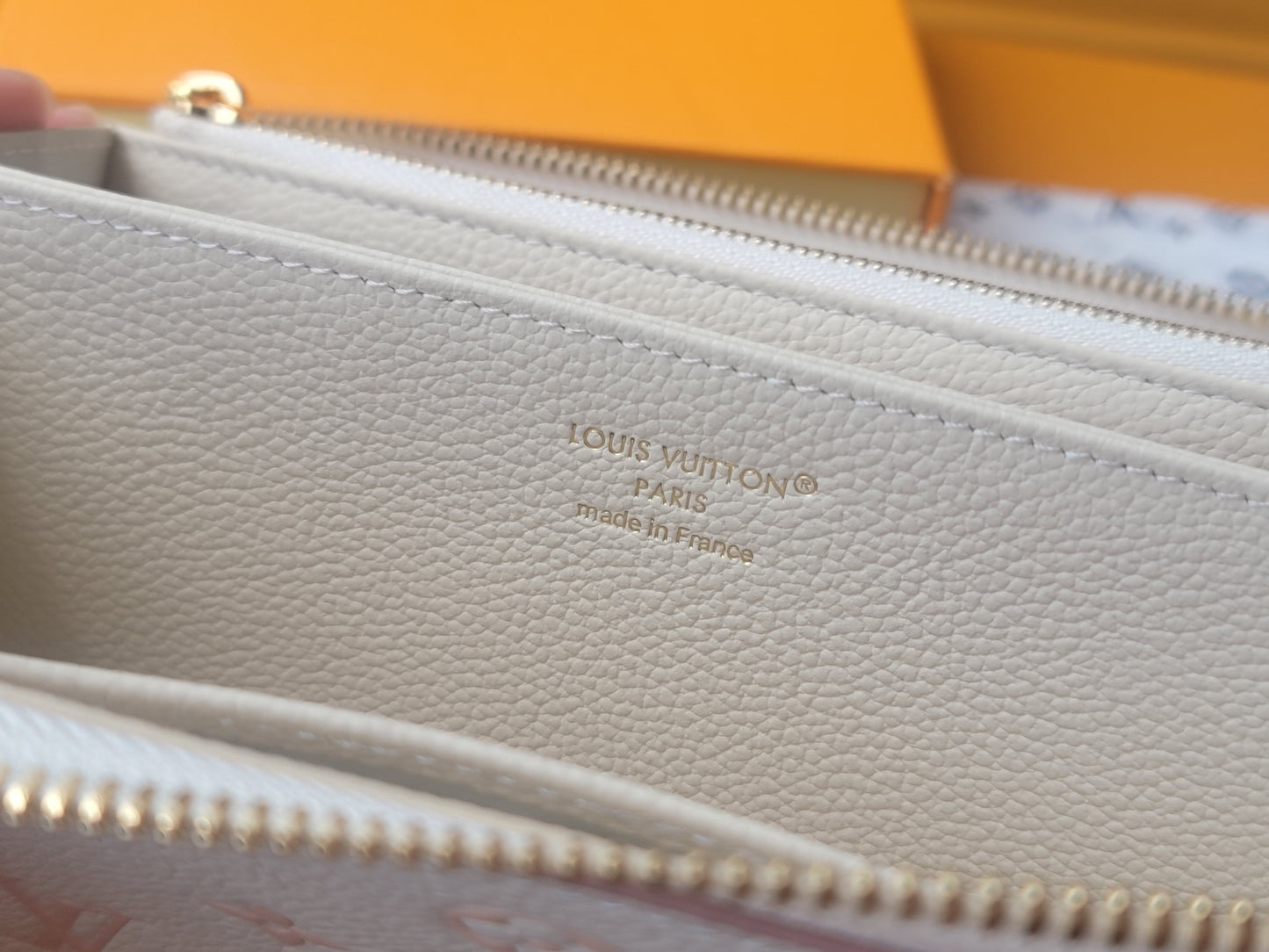 Elegant Louis Vuitton White Leather Wallet With Pink Monogram Embossing For Sophisticated Style M13644