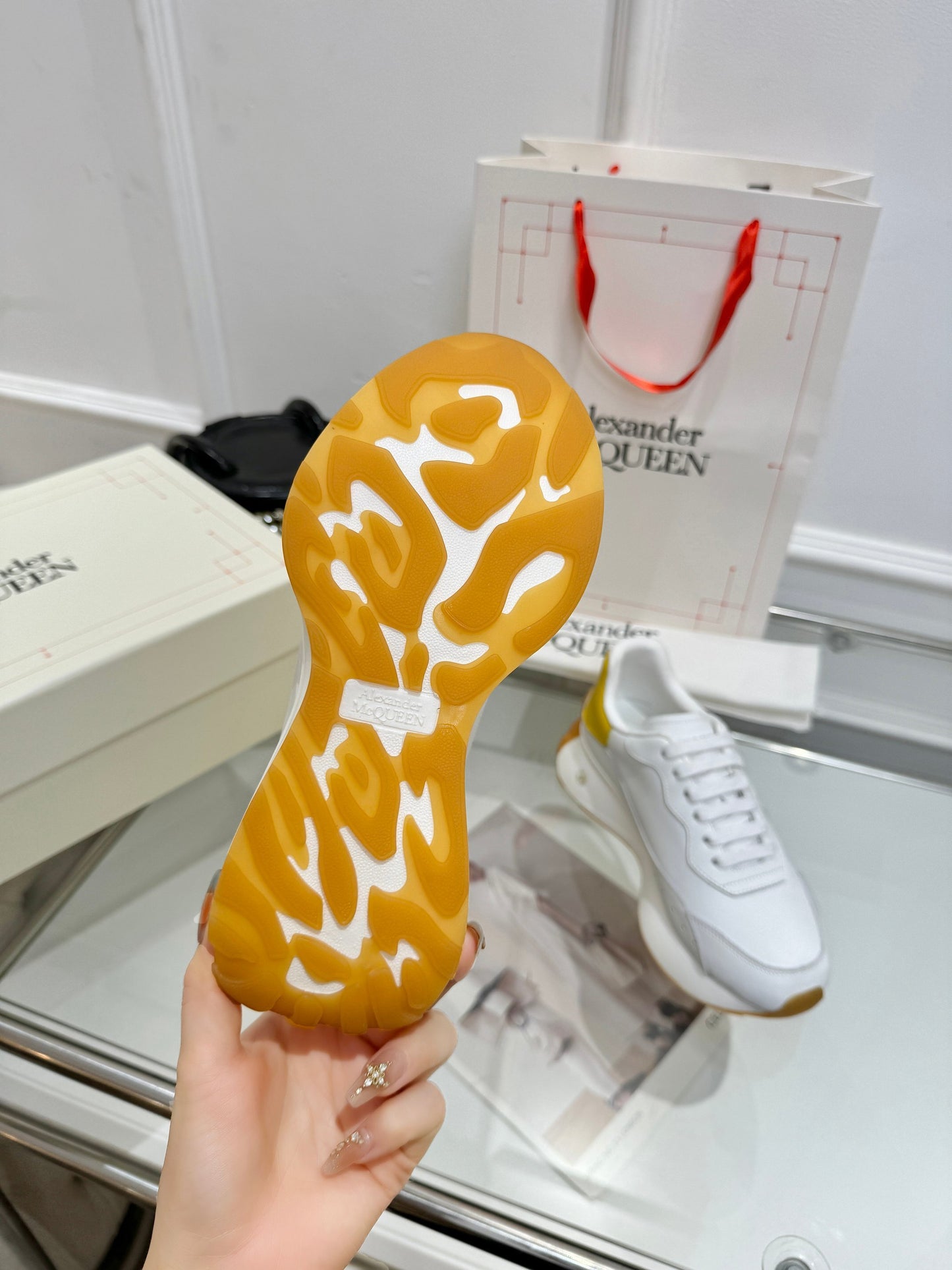 Alexander McQueen Unisex Oversized Sneakers With Metallic Heel Accents