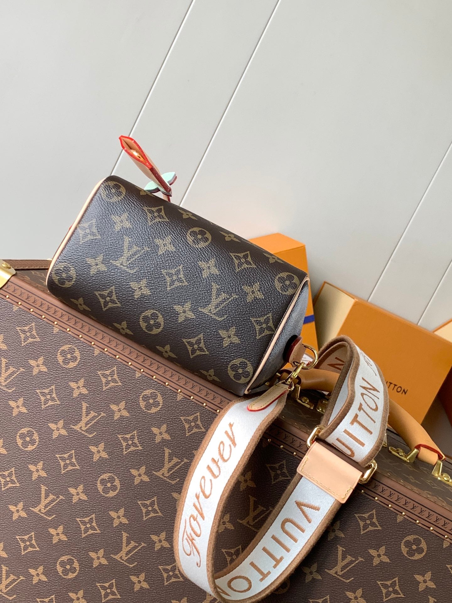 Louis Vuitton Speedy Bandoulière Bag With Colorful Charms And Stylish Strap For Fashion Enthusiasts