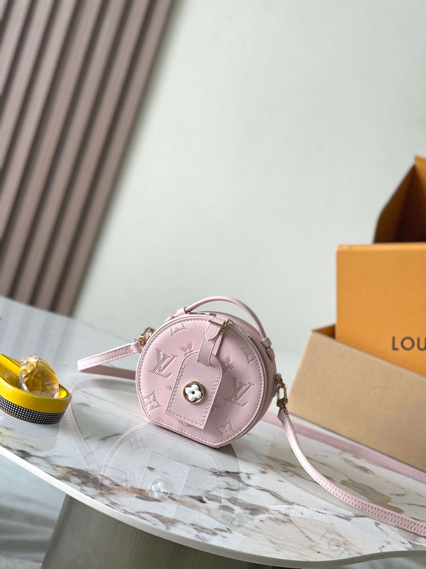 Chic Yellow LV Embossed Round Crossbody Bag With Adjustable Strap And Signature Details