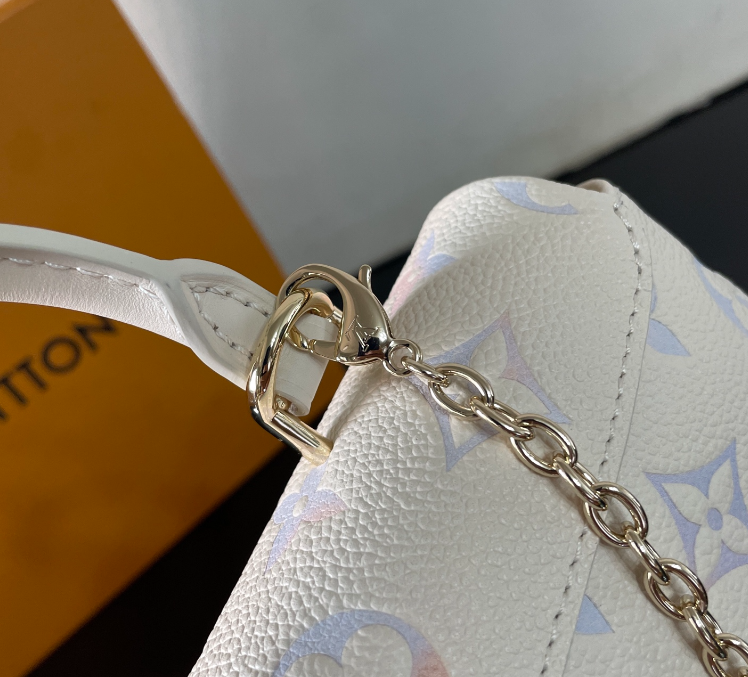 Exquisite Louis Vuitton Handbag With Colorful Monogram And Gold Accents For Trendsetters