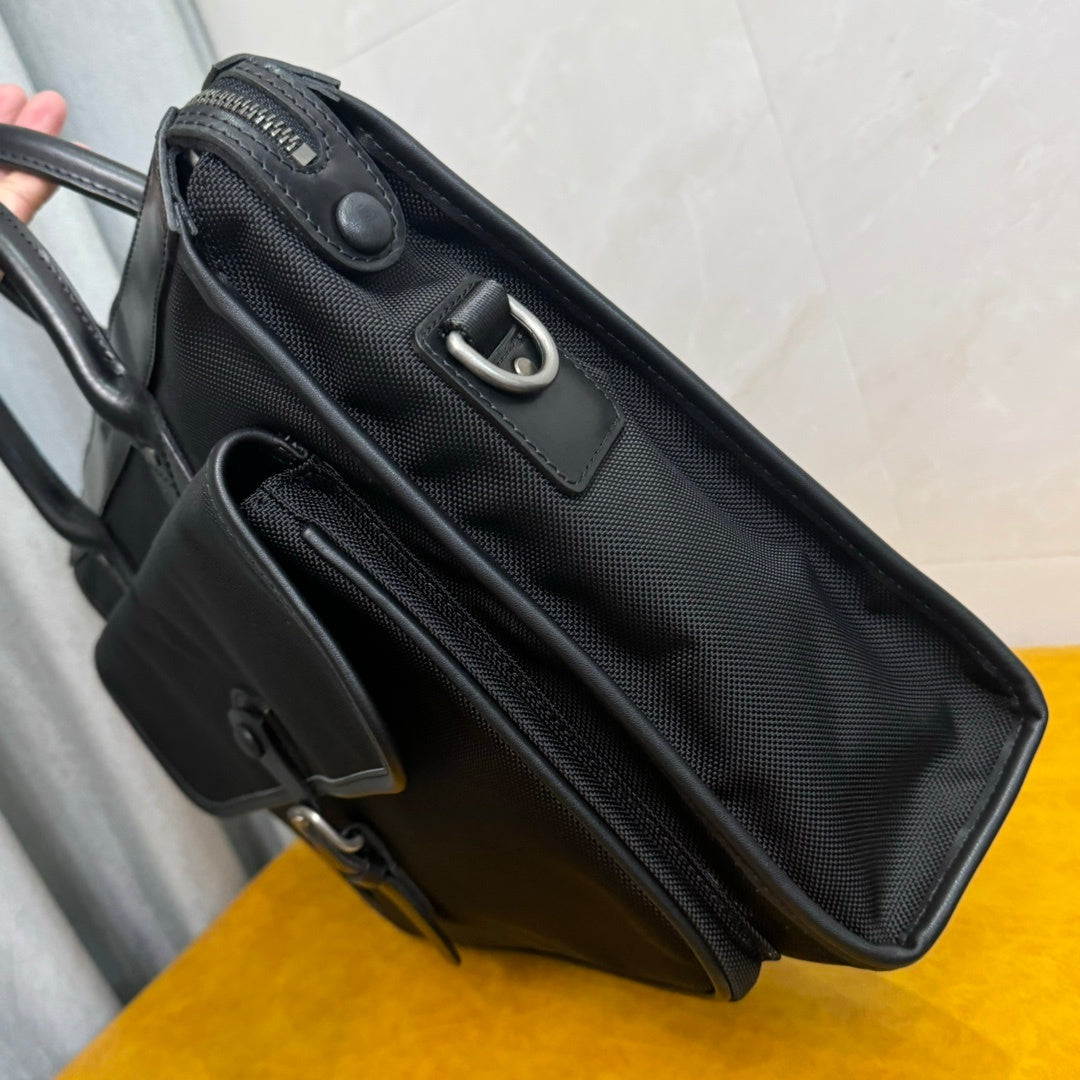 Hermès Black Canvas Briefcase With Leather Trim And Buckle Closure