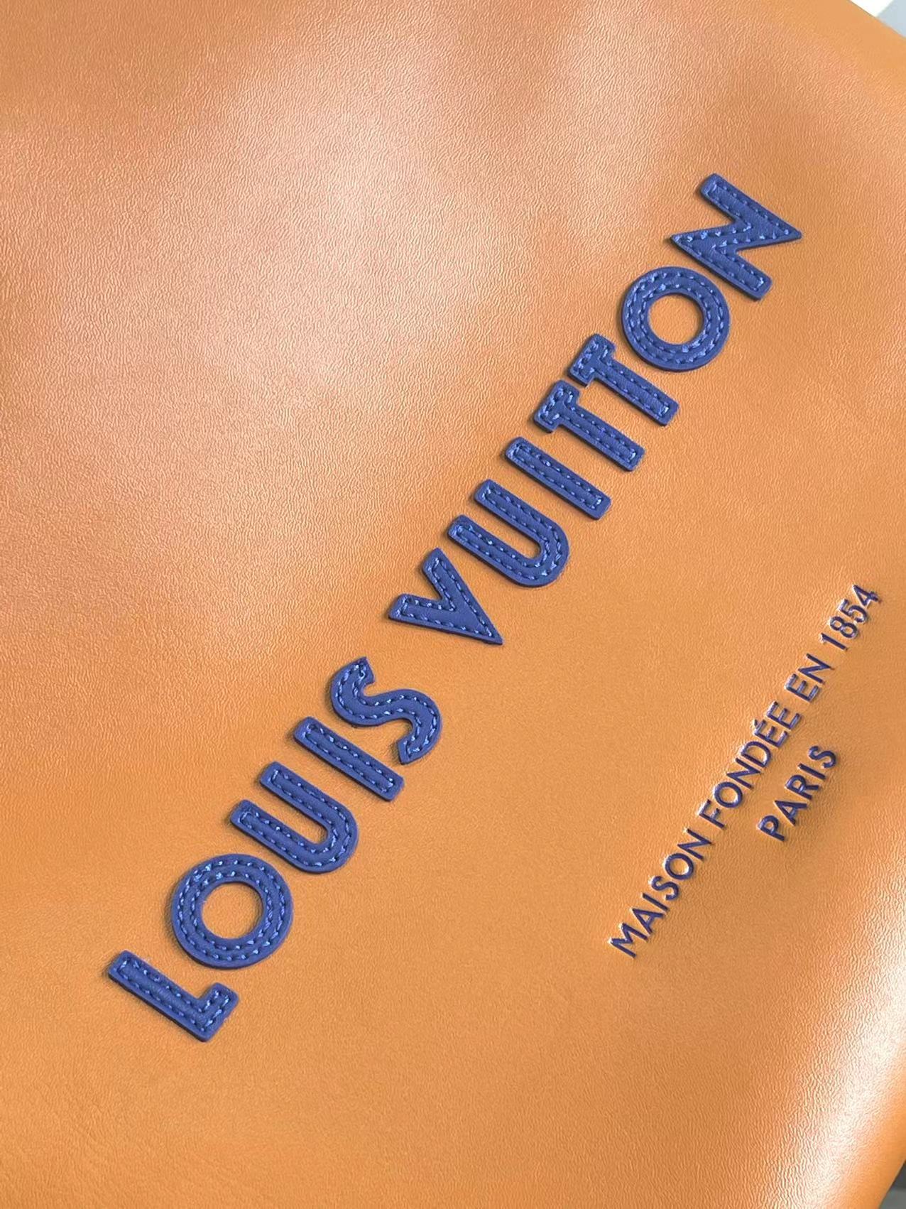 Stylish Orange Louis Vuitton Tote Bag With Blue Handles And Branding