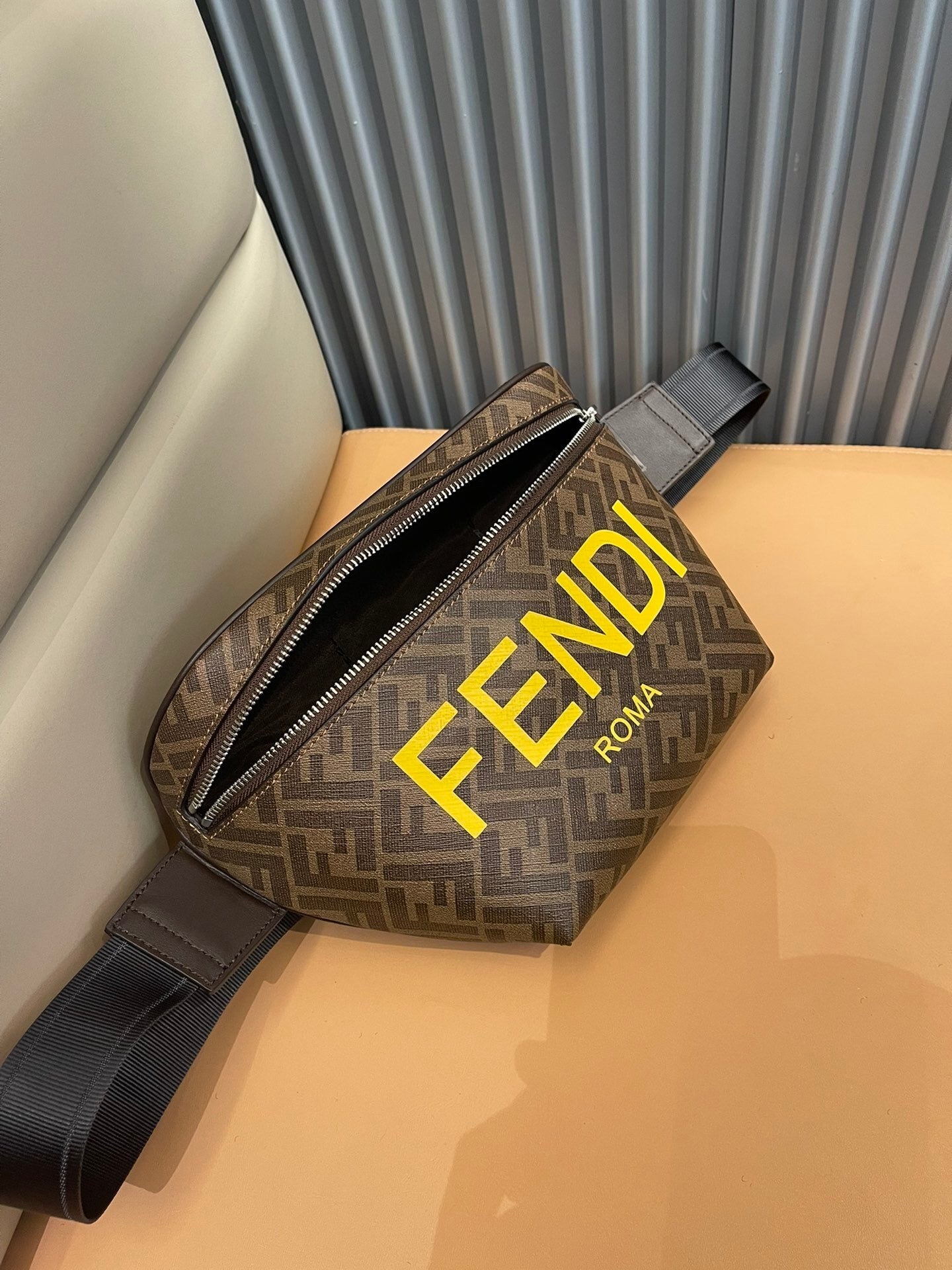 Stylish Fendi Belt Bag With Iconic FF Pattern And Bold Yellow Branding 7vA562