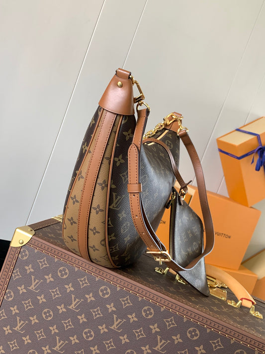 Elegant Louis Vuitton Monogram Crescent Bag with Stylish Straps and Timeless Design