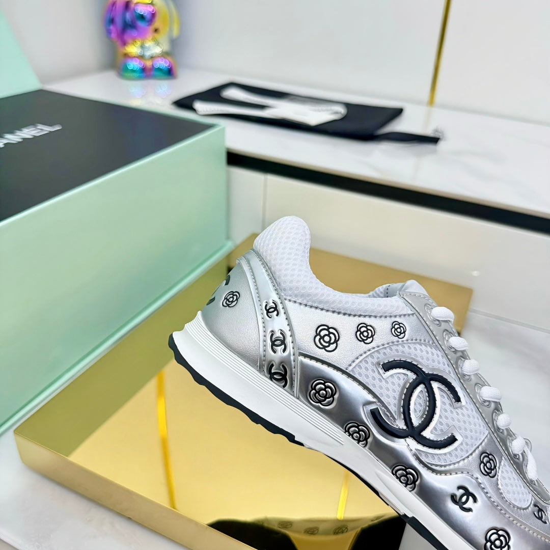 Chanel Silver - Toned Sneakers with Camellia and CC Logo