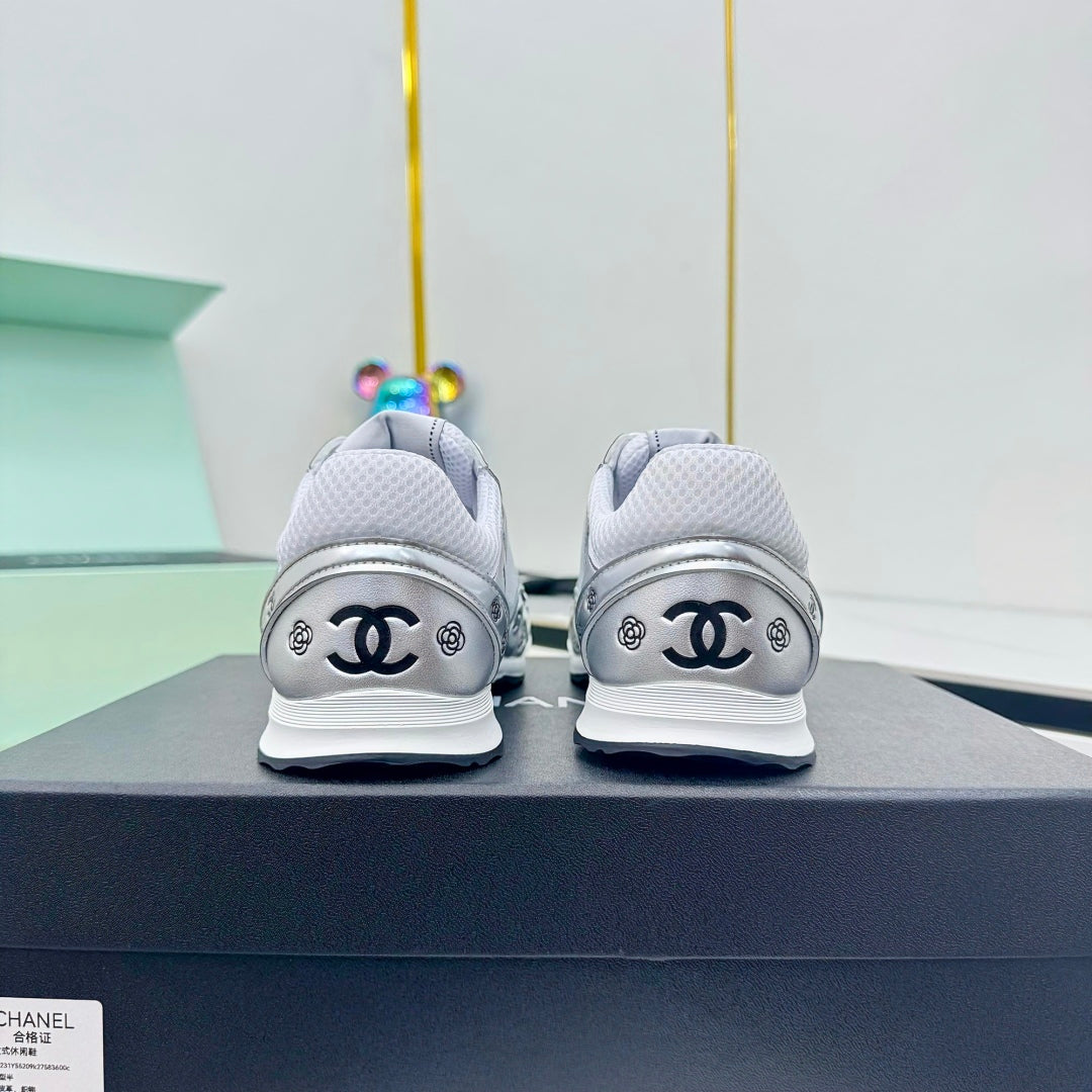 Chanel Silver - Toned Sneakers with Camellia and CC Logo