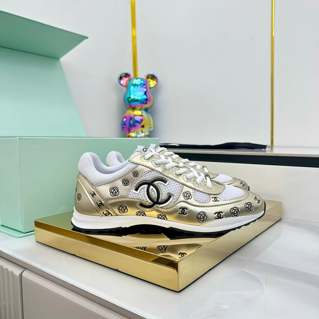 Chanel Silver - Toned Sneakers with Camellia and CC Logo