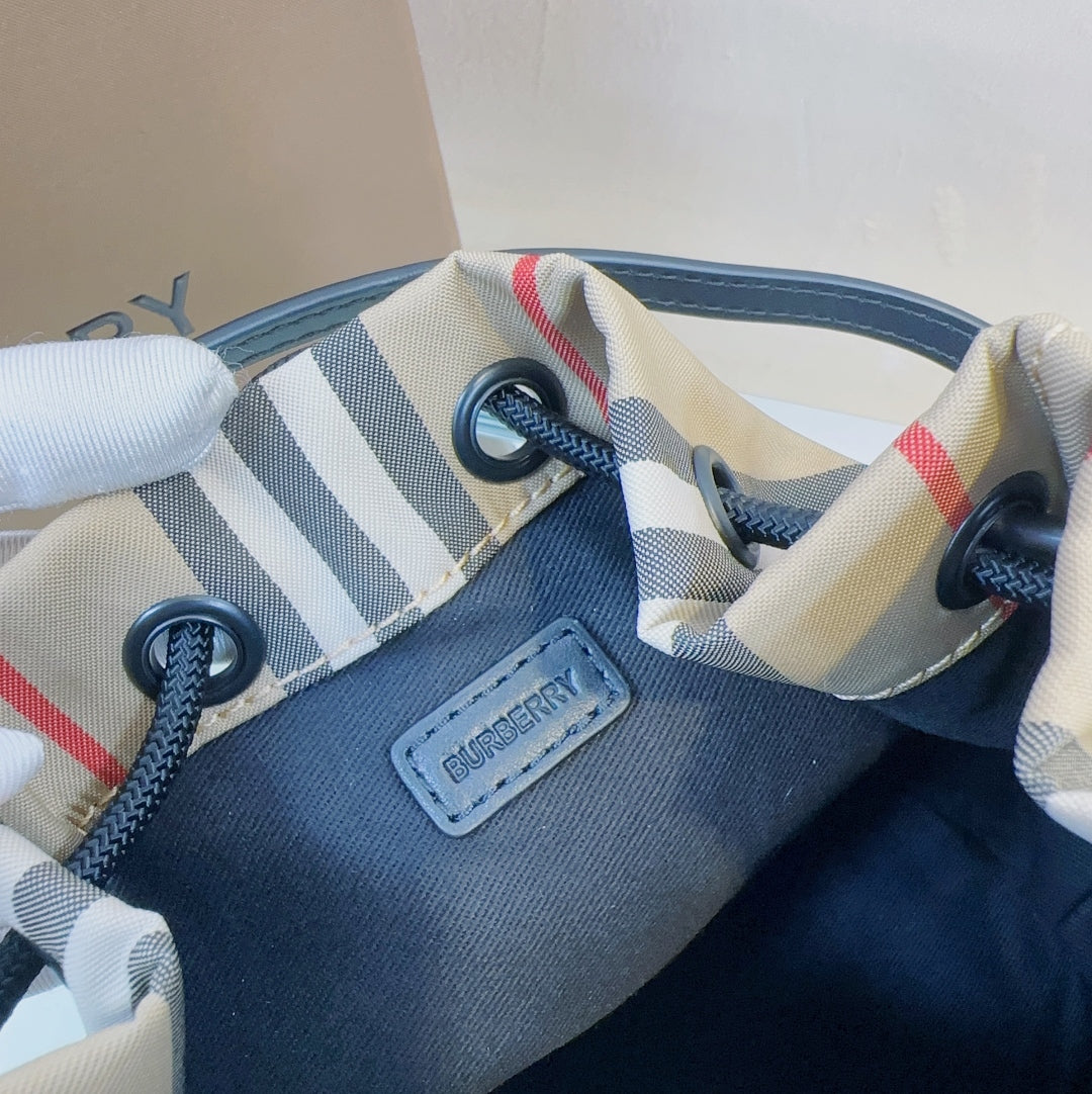 Classic Beige Burberry Striped Bucket Bag With Drawstring Closure And Leather Straps Style No.1151