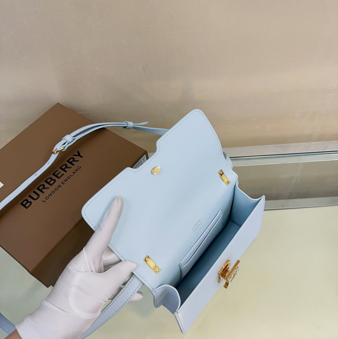 Elegant Light Blue/Brown/Pink Burberry Crossbody Bag With Signature TB Logo And Textured Leather Style No.9141
