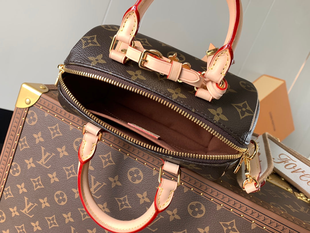 Louis Vuitton Speedy Bandoulière Bag With Colorful Charms And Stylish Strap For Fashion Enthusiasts