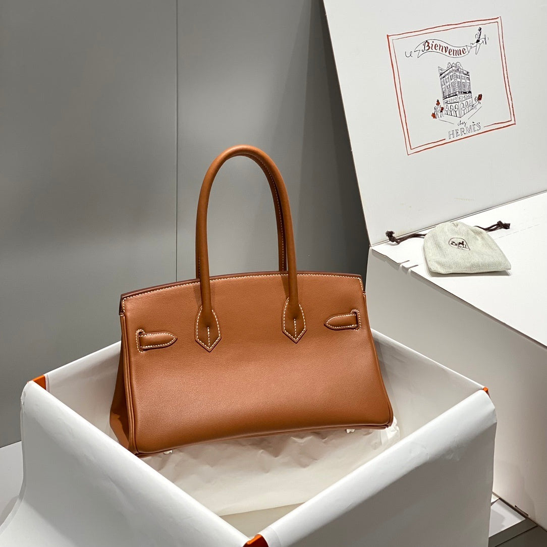 Timeless Hermès Birkin Bag in Classic Brown Leather with Silver Hardware 169