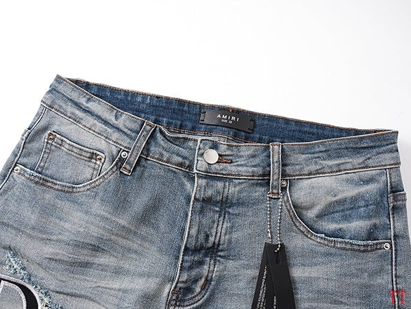 Amiri Light Blue Distressed Denim Shorts With Stylish Logo