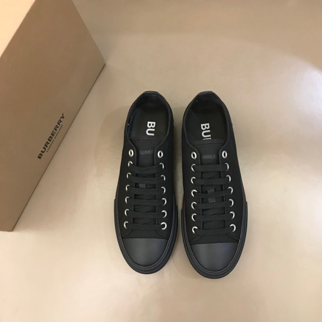 Burberry Unisex Black Canvas Sneakers Stylish Comfortable Footwear For Men And Women With Red Accent Detail
