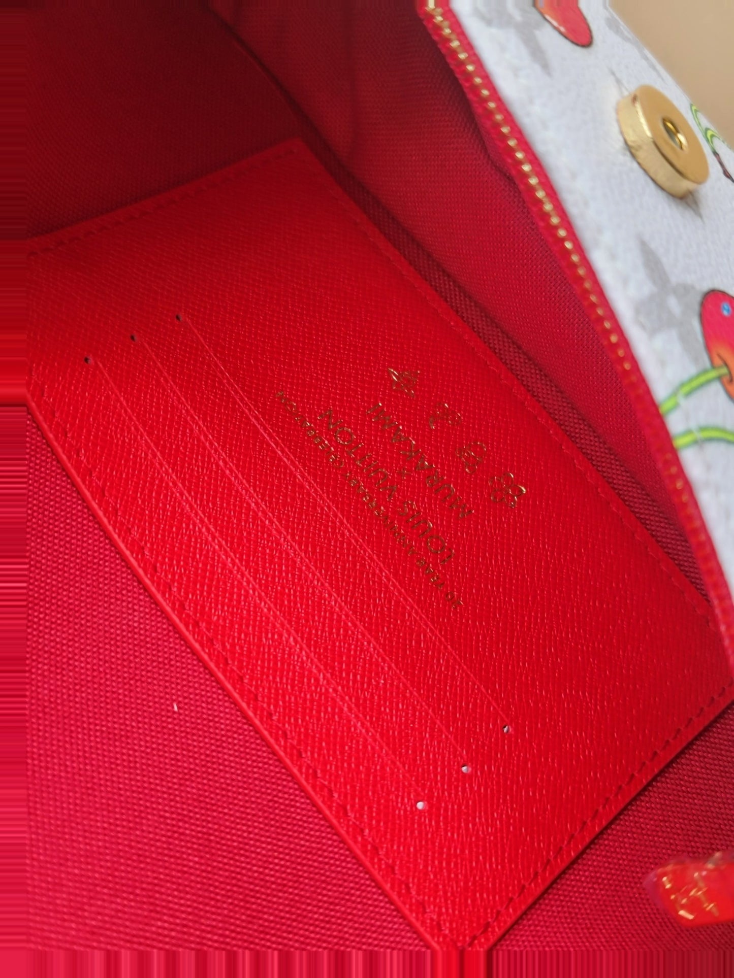Stylish Louis Vuitton Cherry - Printed Bag With Gold Chain For Fashion Enthusiasts