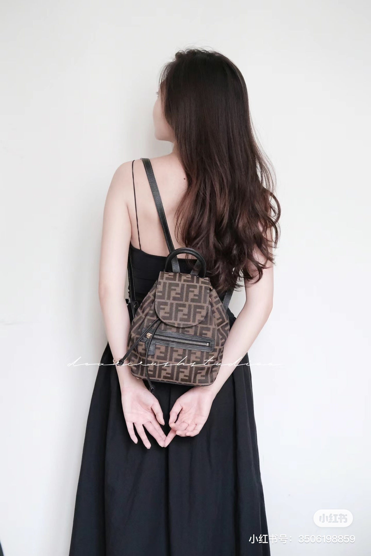 Elegant Fendi Mini Backpack With Iconic FF Pattern And Gold - Tone Hardware 185
