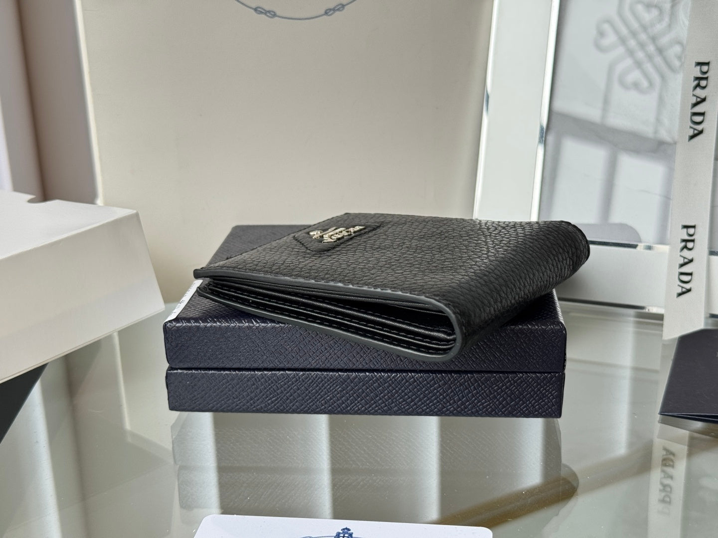 Prada Black Grained Leather Bi - Fold Wallet With Signature Logo 2M0513