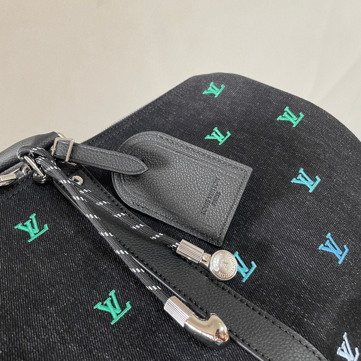 Luxury Black Travel Duffel Bag with Colorful LV Monogram for Stylish Weekend Getaways