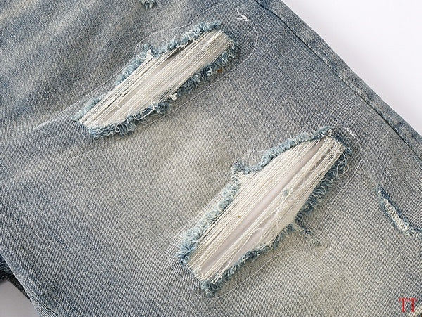 Amiri Light Blue Distressed Denim Shorts With Artful Rips
