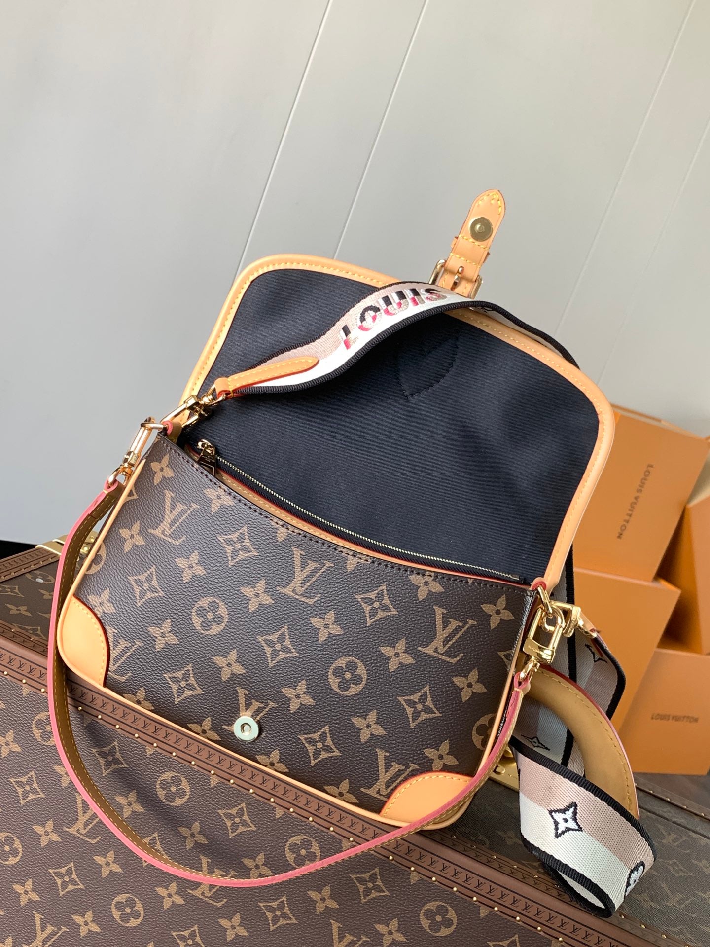 Stylish Louis Vuitton Monogram Crossbody Bag With Colorful Webbing Strap And Buckle Detail