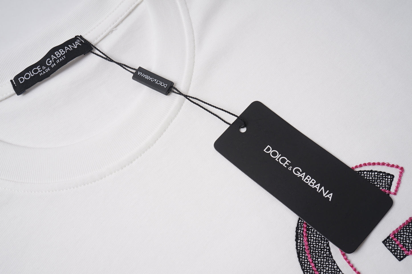 Stylish Dolce & Gabbana White/Black T - Shirt With Eye - Catching D&G Logo For Fashion Lovers