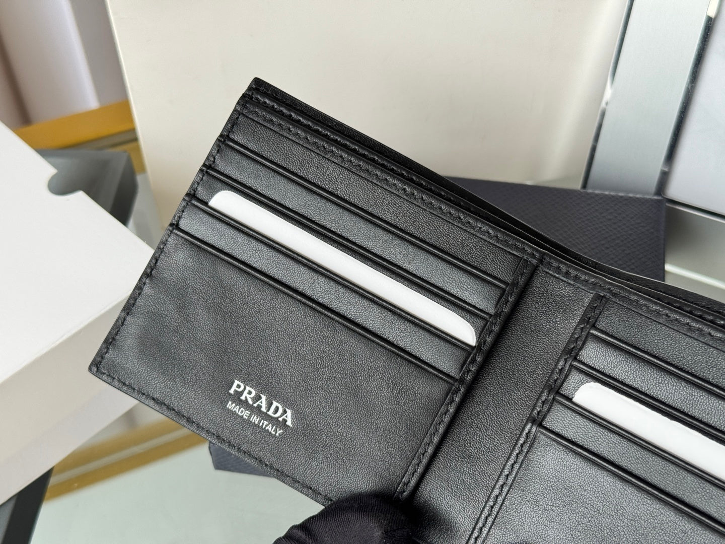 Prada Black Grained Leather Bi - Fold Wallet With Signature Logo 2M0513