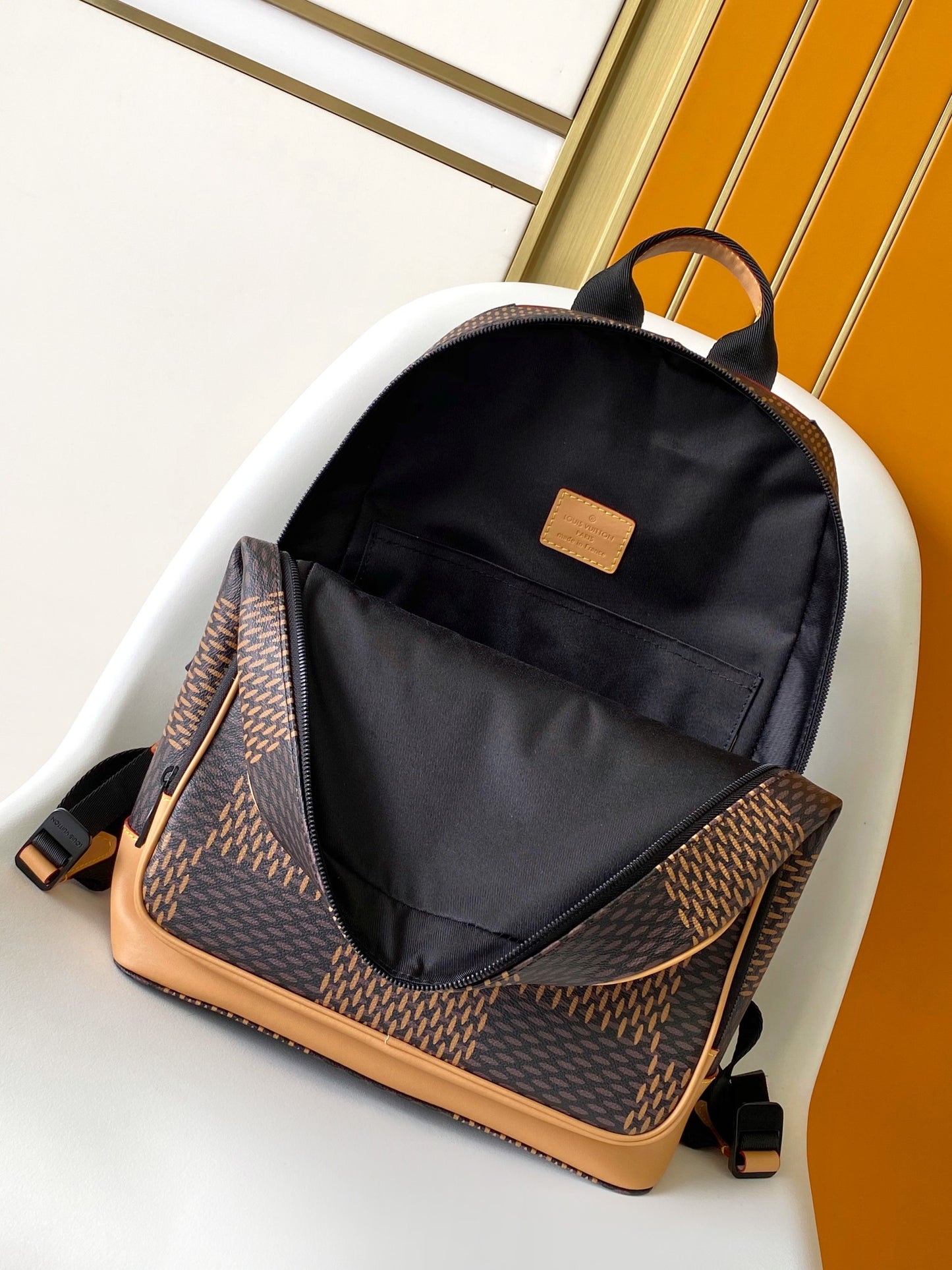 Louis Vuitton Backpack With Classic Monogram And Checkered Patterns For Fashion Enthusiasts