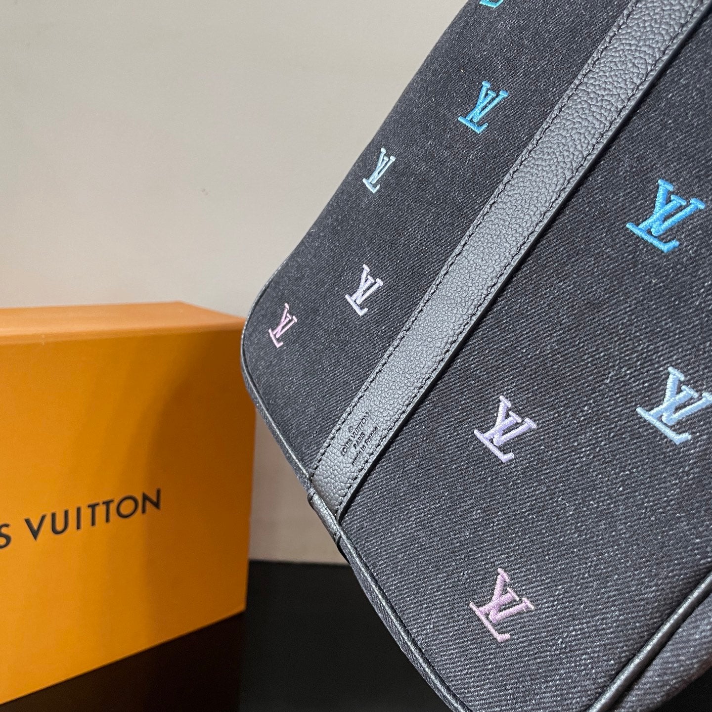 Luxury Black Travel Duffel Bag with Colorful LV Monogram for Stylish Weekend Getaways