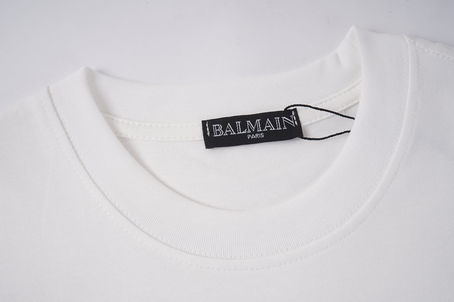 Balmain Black/White Tee With Embroidered Leopard Logo For Luxury Streetwear Style