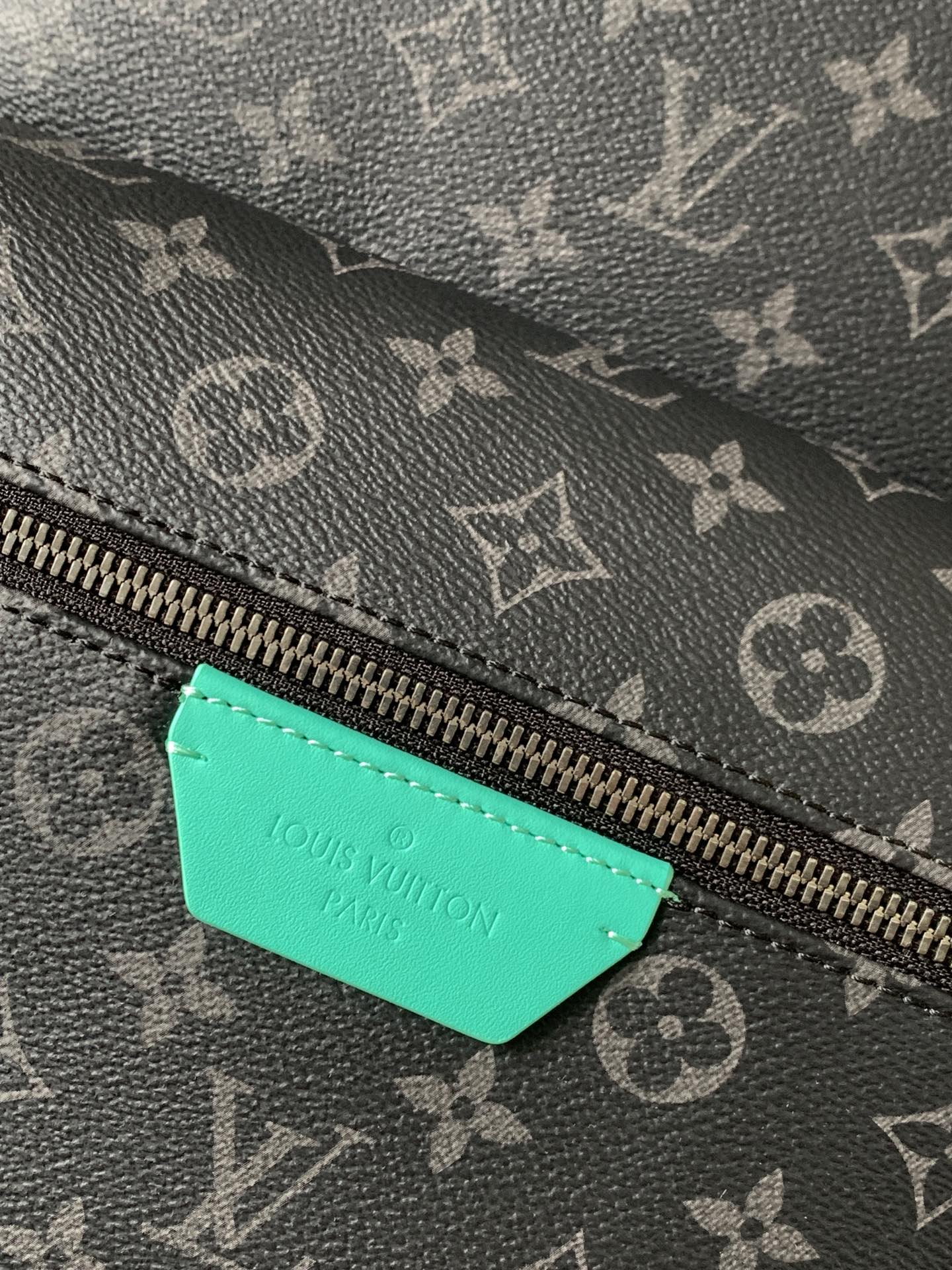 Stylish Louis Vuitton Monogram Backpack With Turquoise Accents And Functional Design