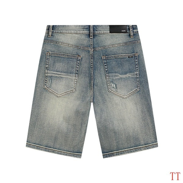 Amiri Light Blue Distressed Denim Shorts With Artful Rips