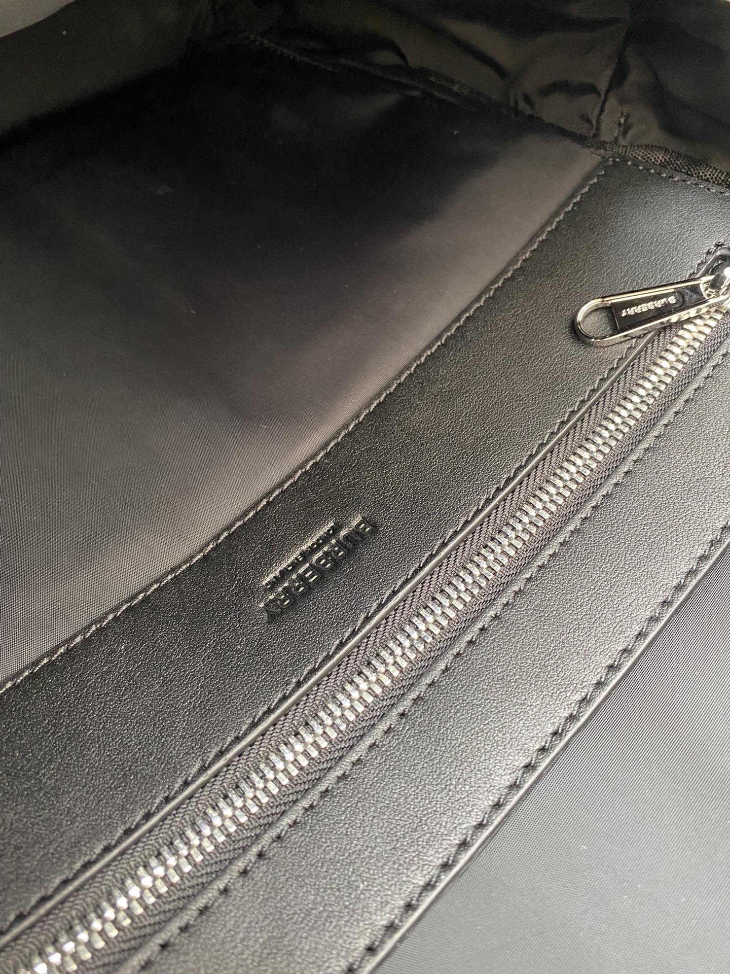 Sleek Black Burberry Backpack With Durable Nylon Material And Signature Branding Style No.3316