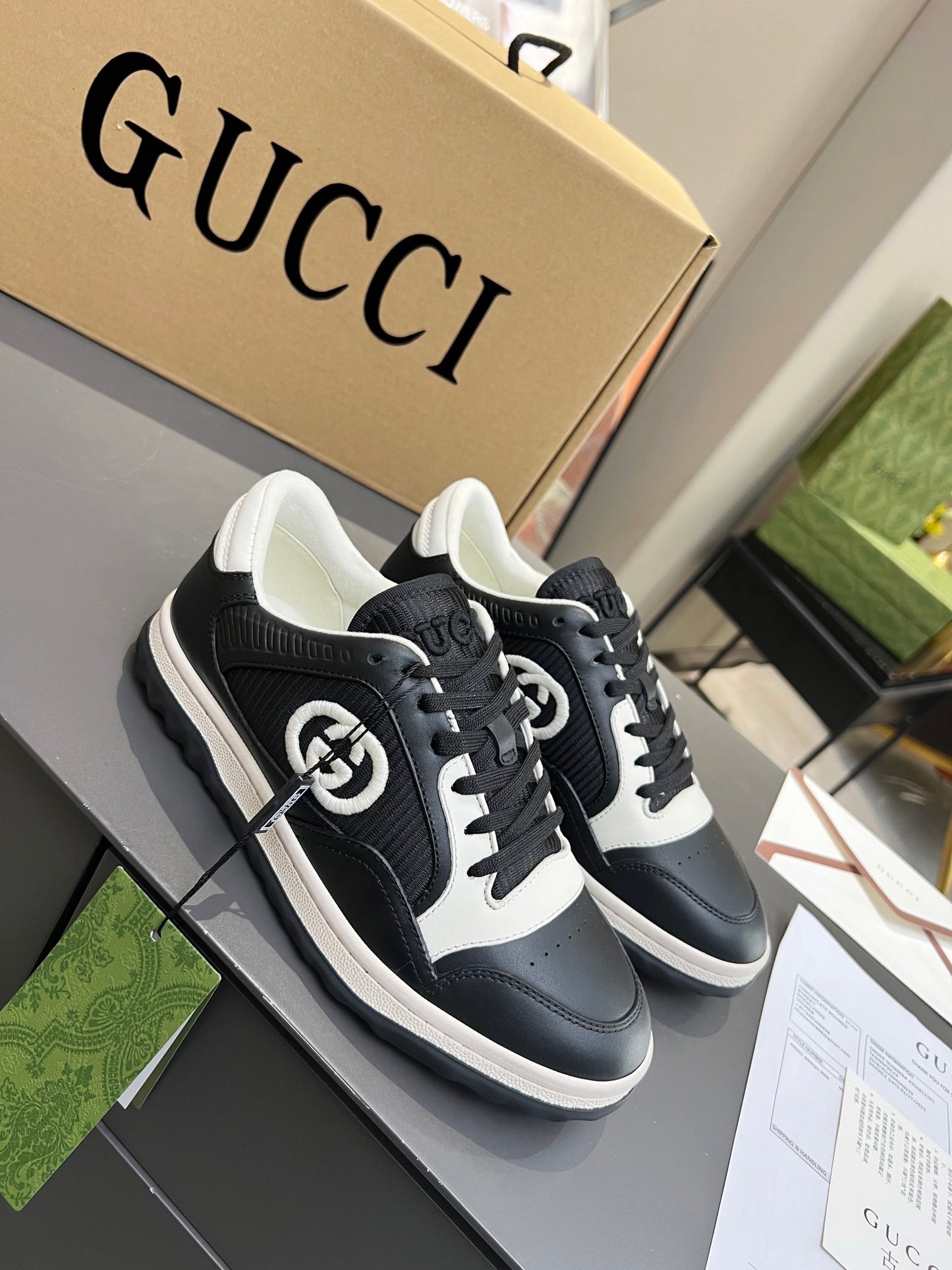 Gucci Black And White Leather Sneakers With Interlocking G