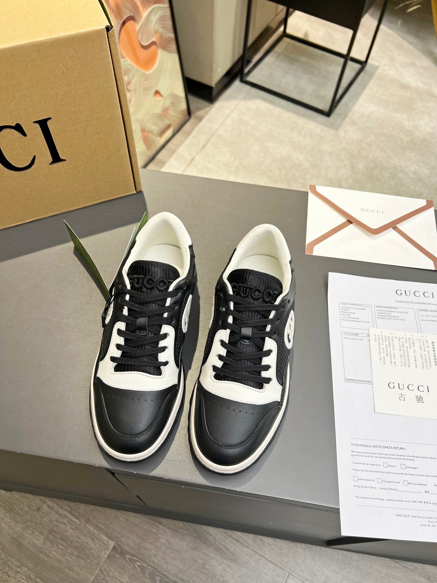 Gucci Black And White Leather Sneakers With Interlocking G