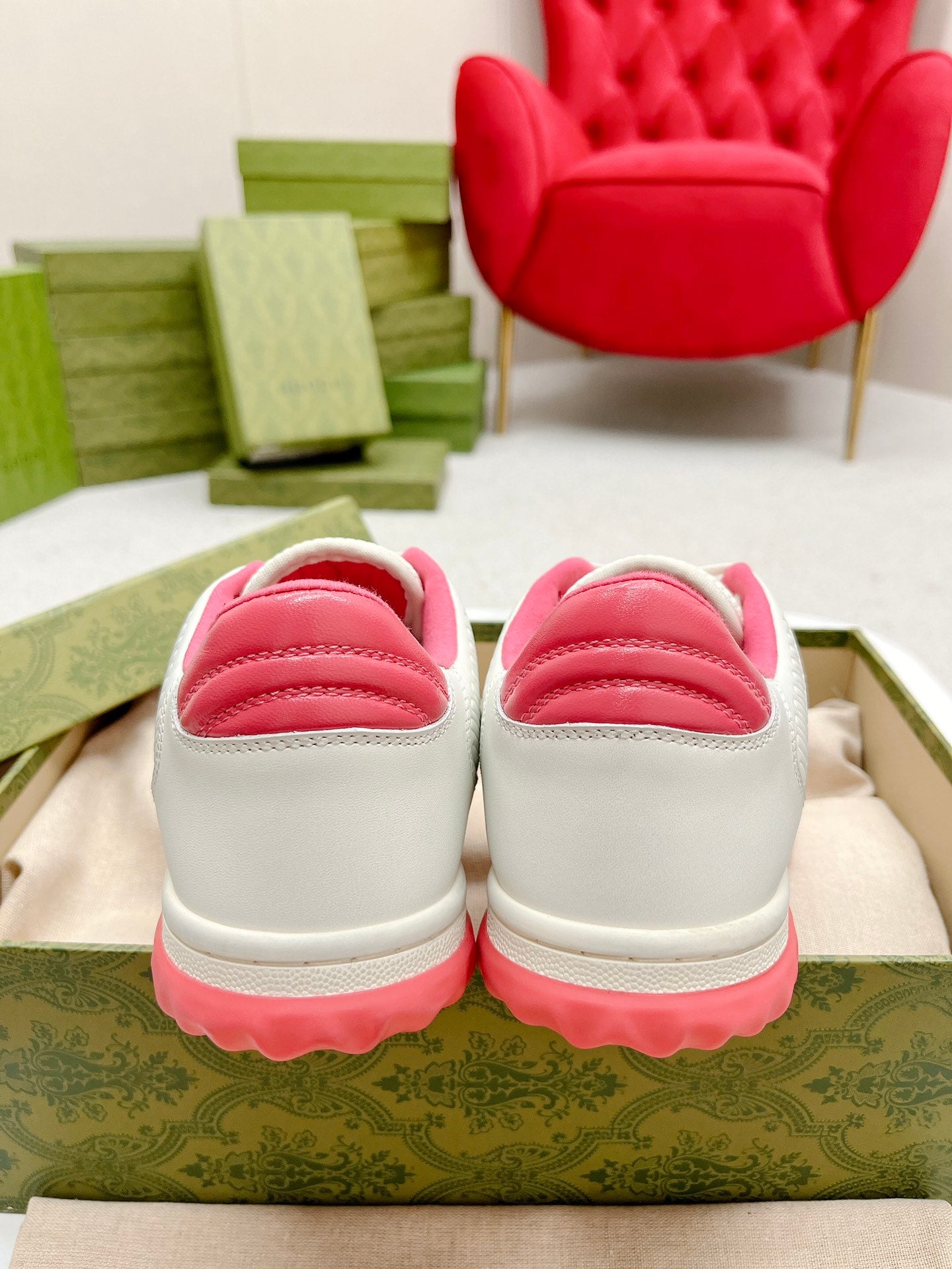 Stylish White And Pink Gucci Sneakers On Display