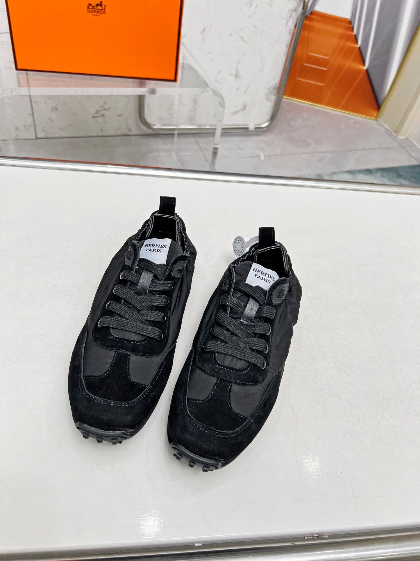 Hermès Unisex All - Black Sneakers For Timeless Luxury Casual Style