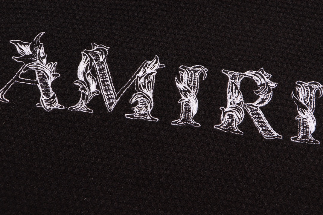 Amiri Men's Black Crew Neck Knitted Sweater With Intricate Lettering Design