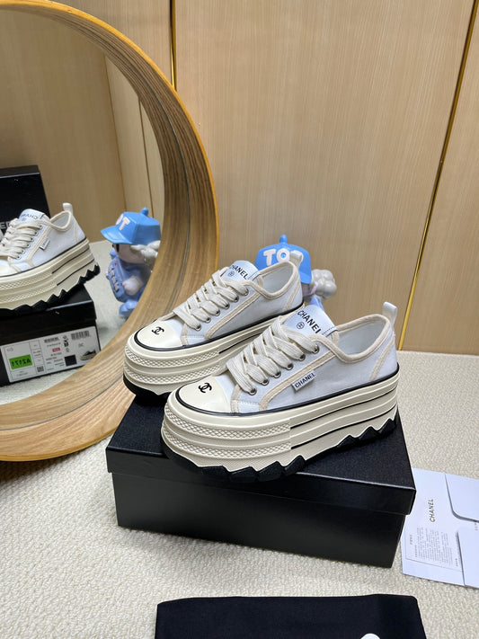 Chanel Black And White Platform Canvas Sneakers With CC Logo