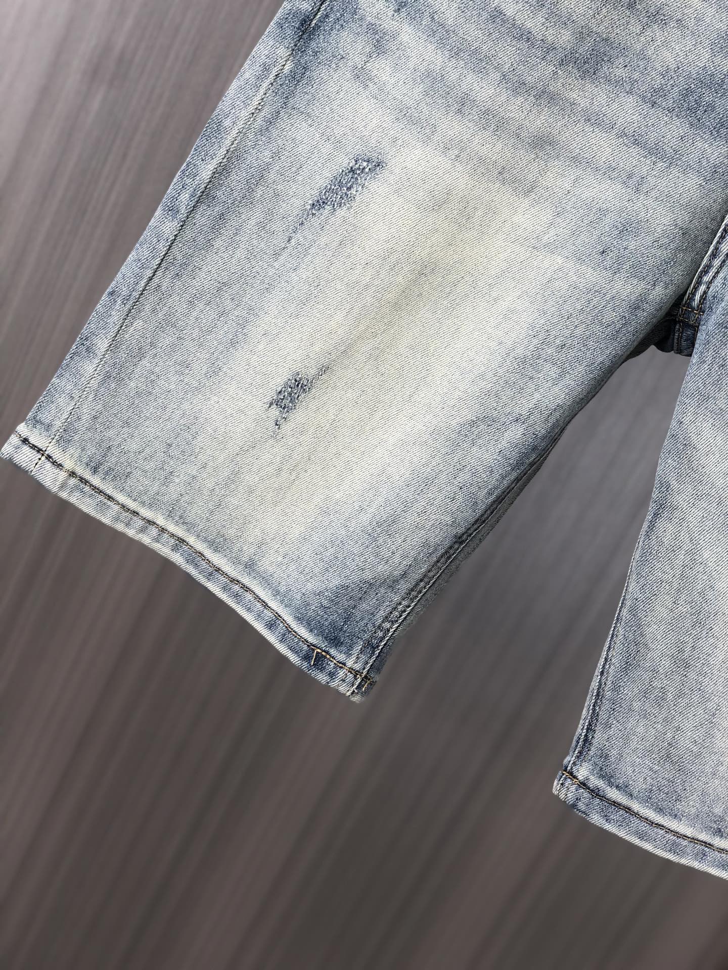Burberry Men's Light Blue Distressed Denim Shorts With Classic Style
