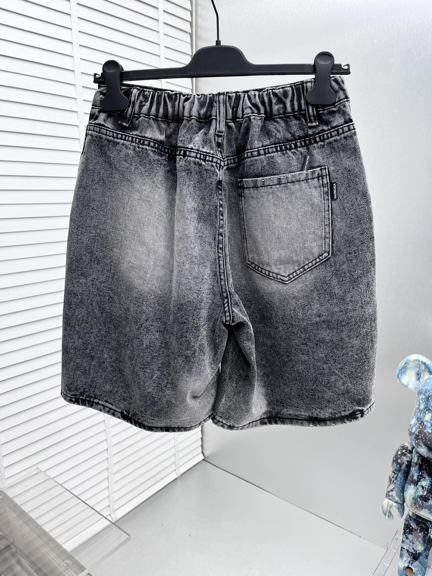 Balenciaga Distressed Patchwork Denim Shorts With Vintage Style