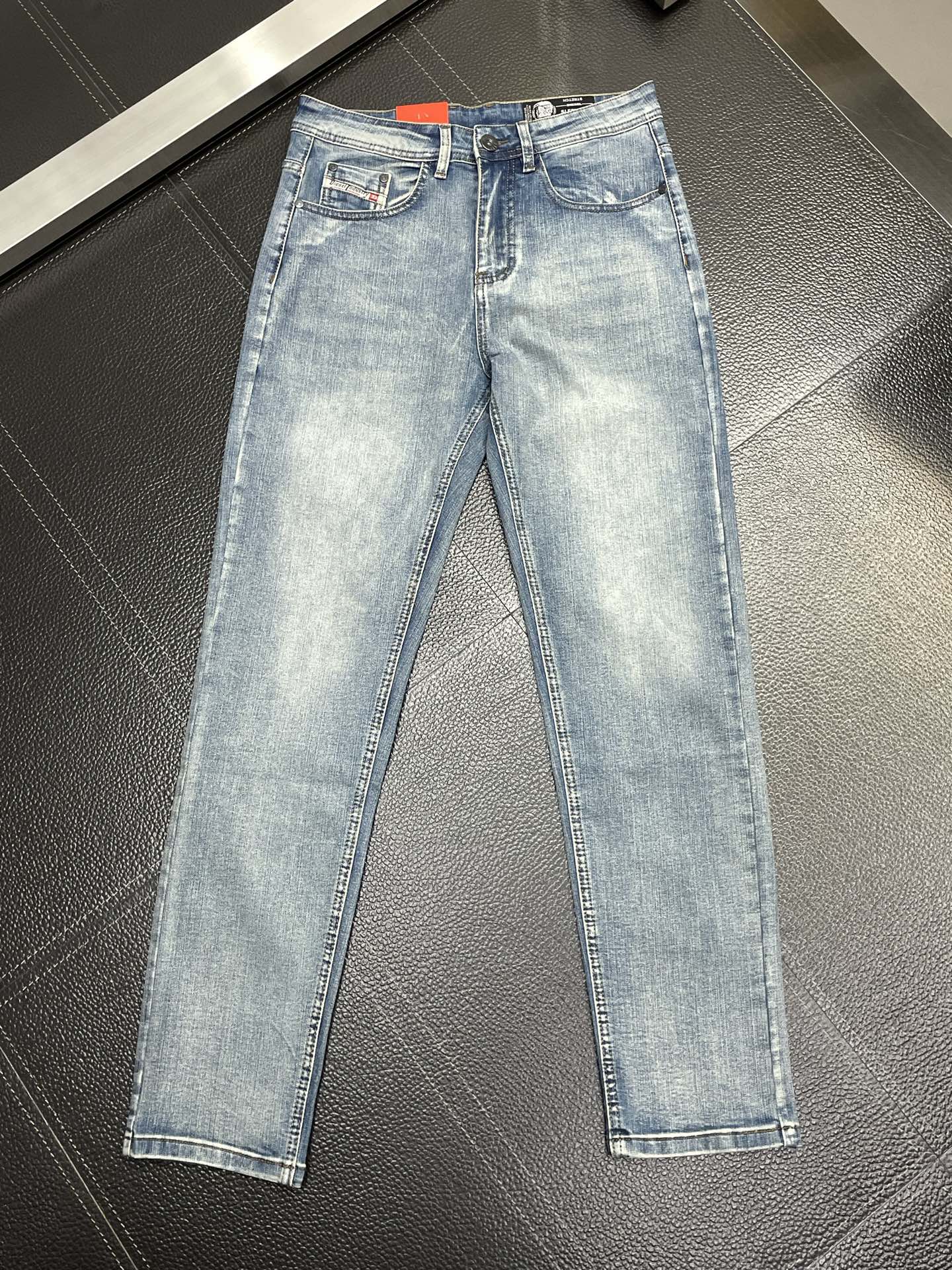 Diesel Men's Light Blue Washed Slim-Fit Denim Jeans with Iconic Details