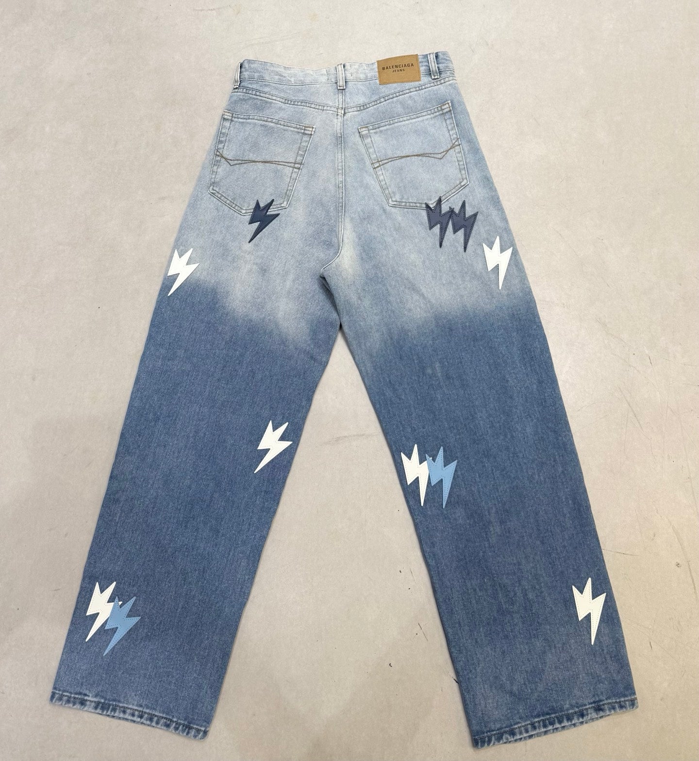Balenciaga Unisex Jeans With Lightning Bolt Prints And Gradient Design