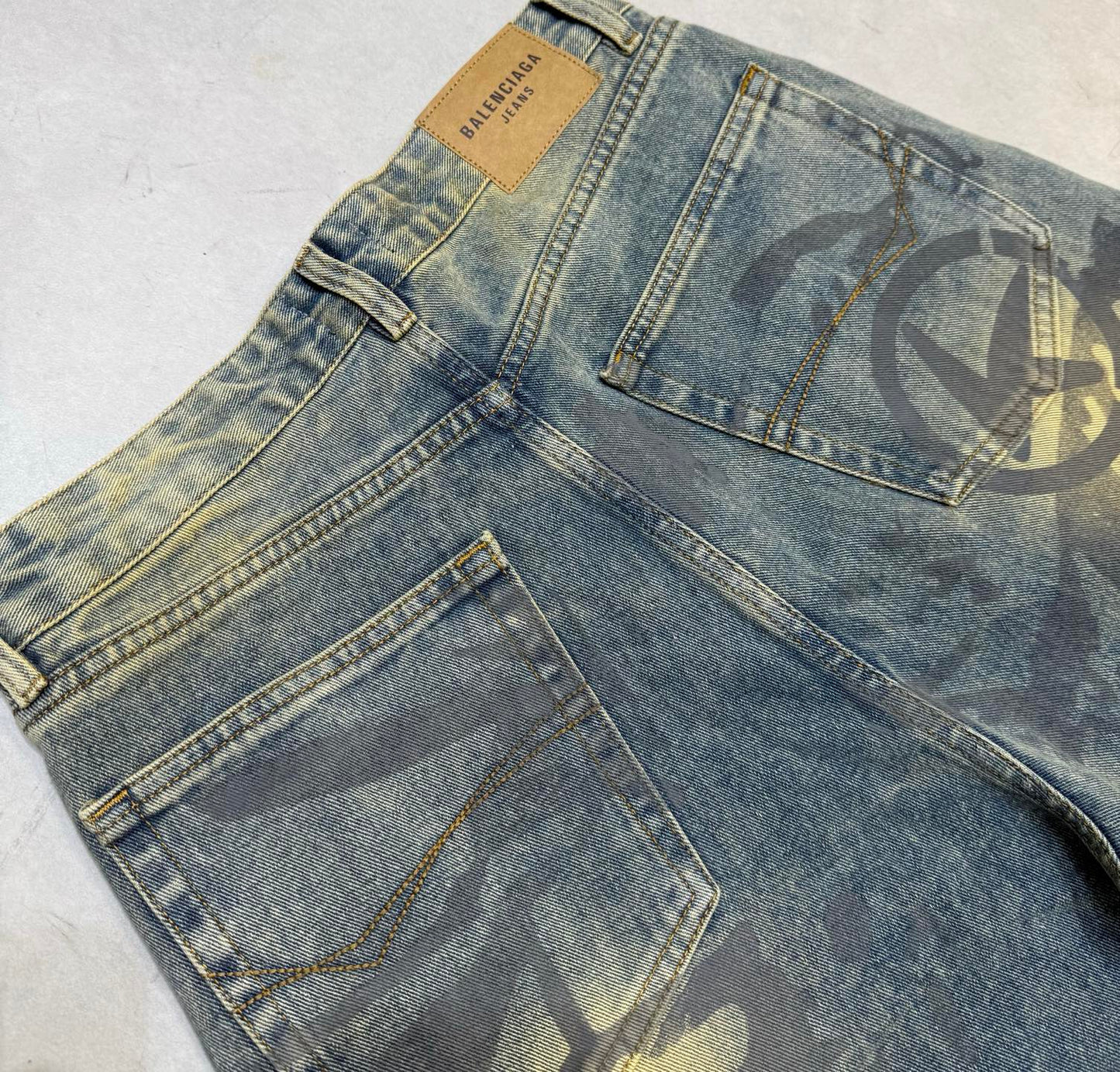 Balenciaga Unisex Jeans With Artistic Pattern And Vintage Wash