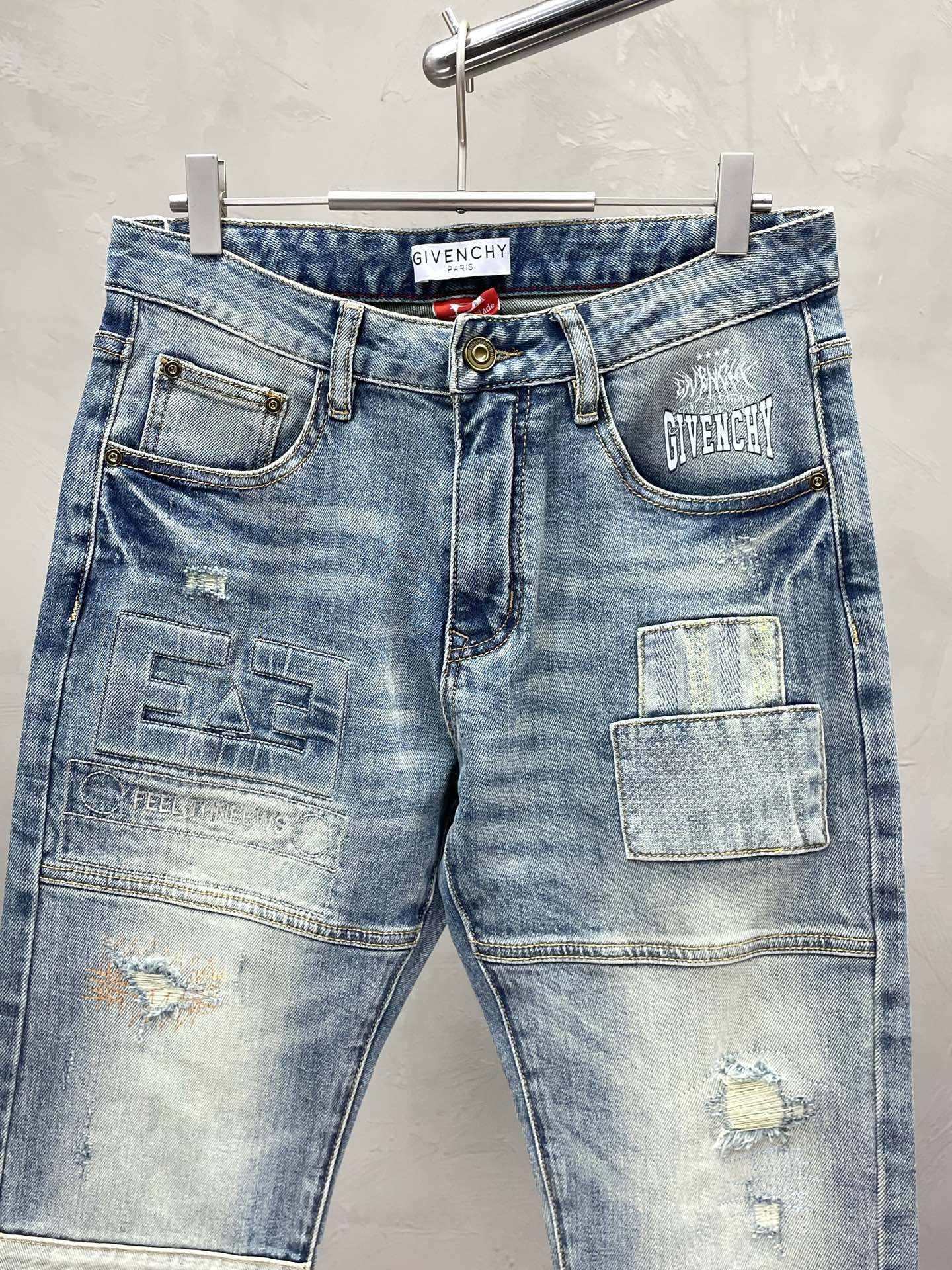 Givenchy Light Blue Distressed Patchwork Denim Jeans For Fashion - Forward Style